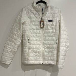 Patagonia woman’s white nano puff jacket size medium